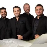 Grupa MAESTRO - Šest članova benda u crnim odelima