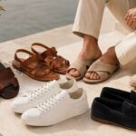 Muške sandale, papuče, bele patike, espadrile i mokasine na sunčanoj terasi